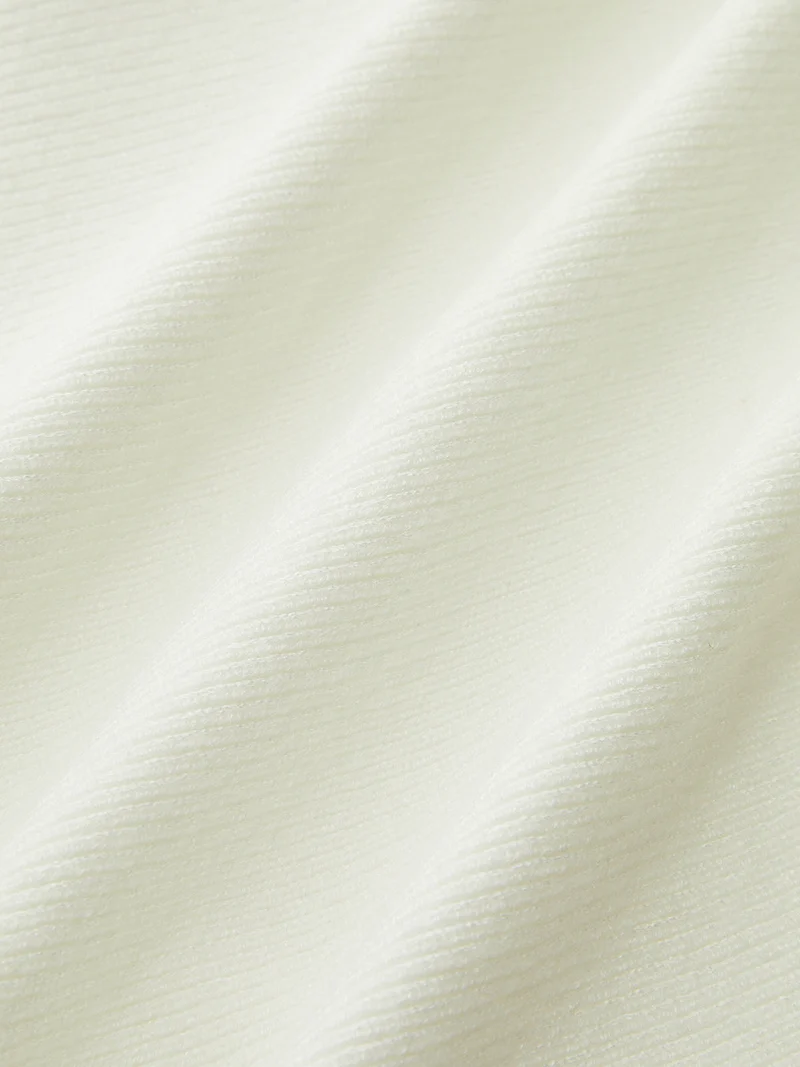 Enya – Strickoberteil mit Schleife und Schößchen