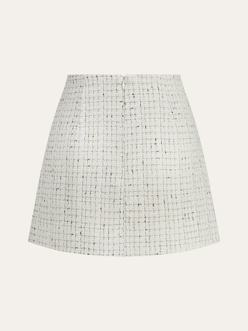 Hedwig - Minirock aus plissiertem Tweed mit Metallknöpfen