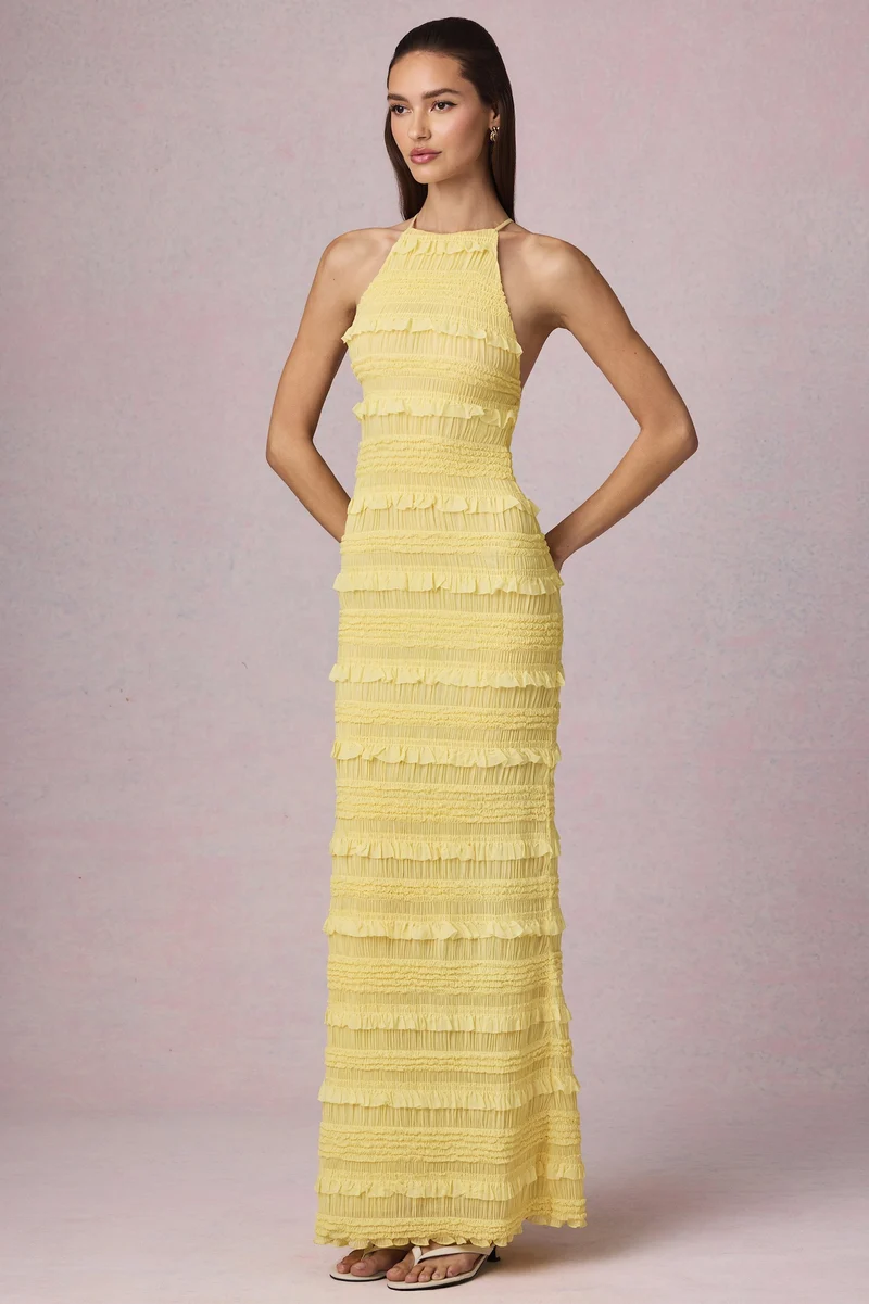 Elisa – Rückenfreies Maxikleid mit Neckholder in Zitronengelb