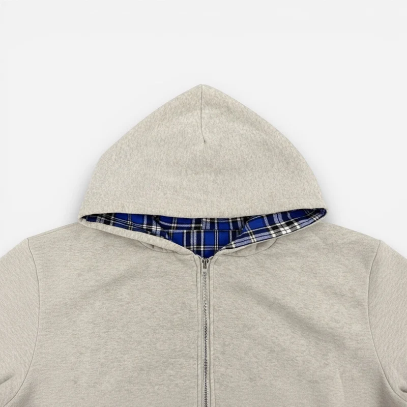Oversized 2-in-1 Wende-Hoodie mit Karoseite