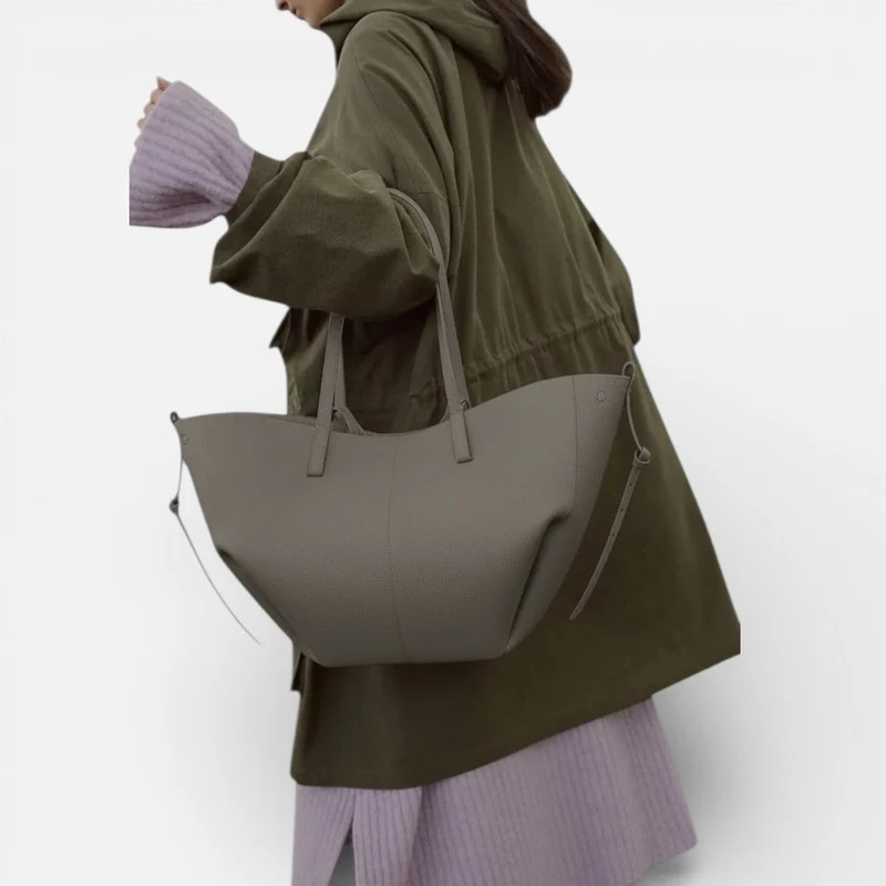 Große Damen Handtasche mit breiten Seiten und Schultergriffen