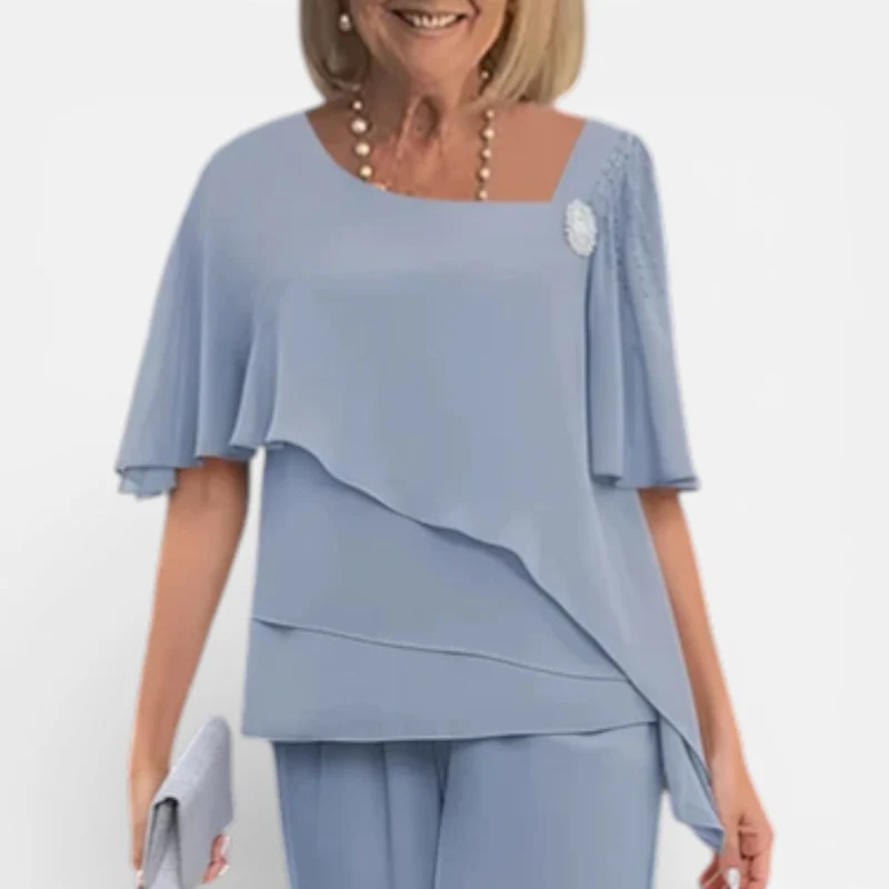 Eleganter Damen Hosenanzug mit fließender Bluse und weiter Hose