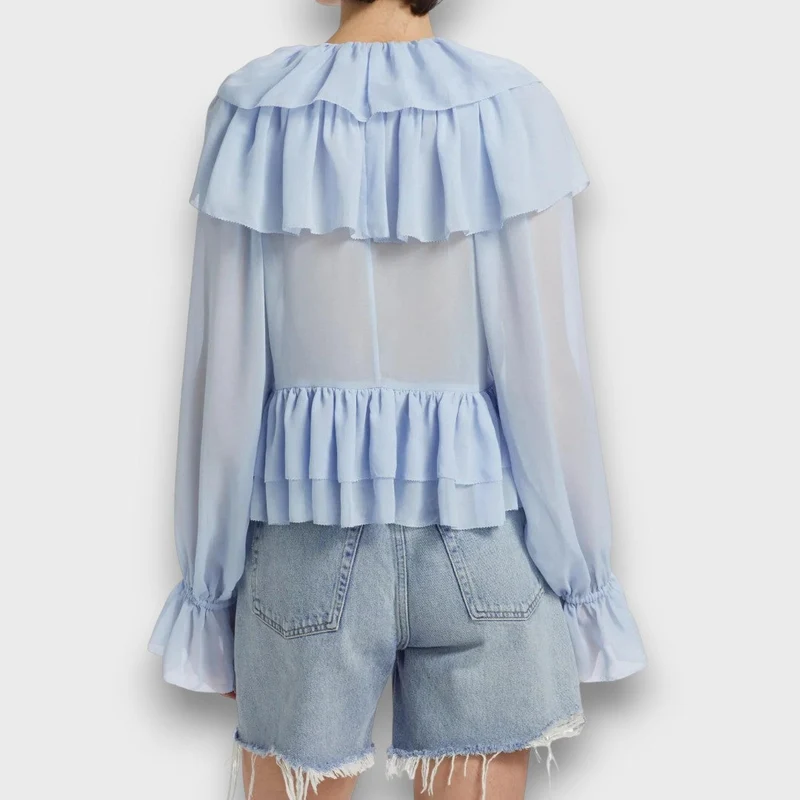 Elorie – Verspielte Volantbluse mit Retro-Flair