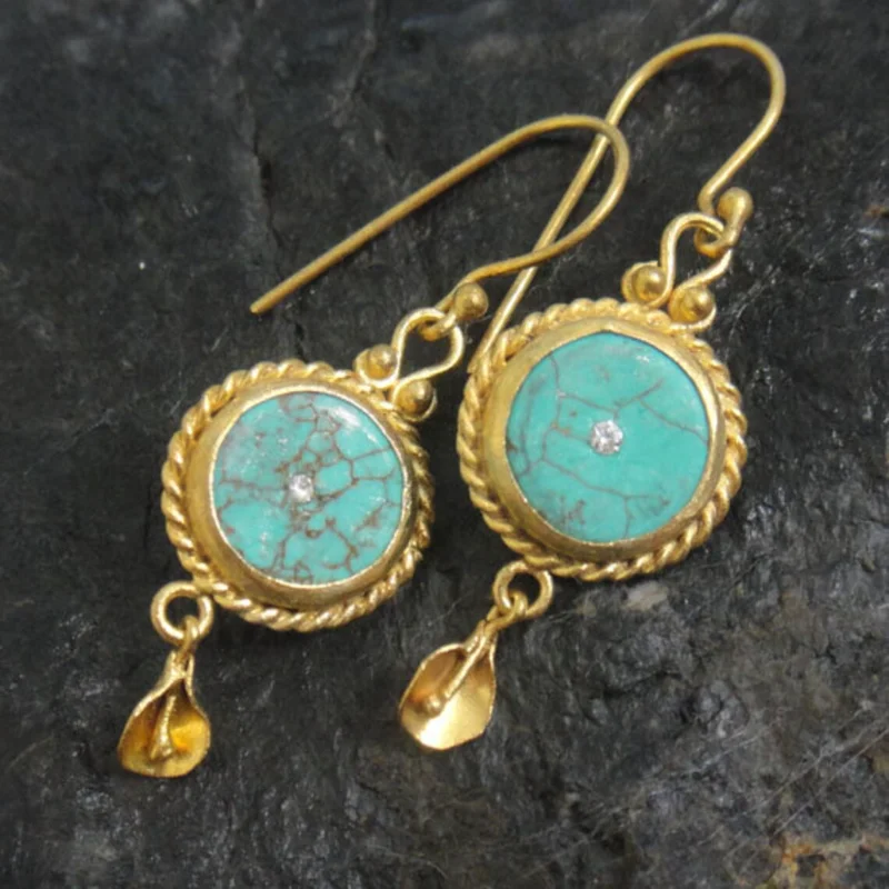 Vintage-Ohrringe aus Gold mit Türkisstein