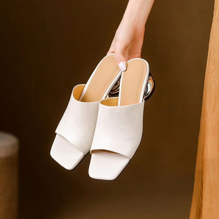 Virelle Curve Leder Mules mit Absatz