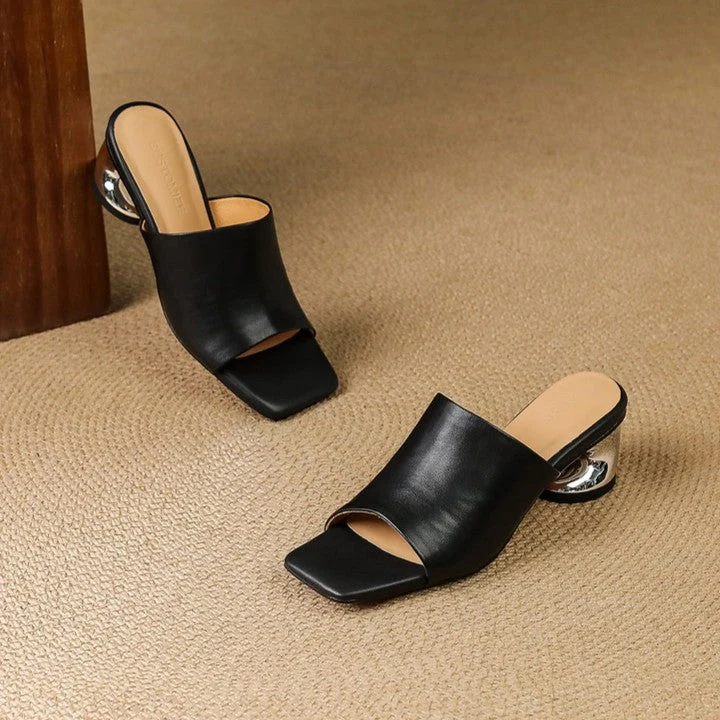 Virelle Curve Leder Mules mit Absatz