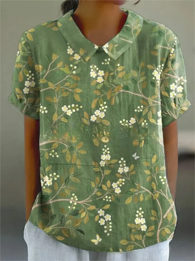Damen Polo mit floralem Stickmuster und kurzen Ärmeln