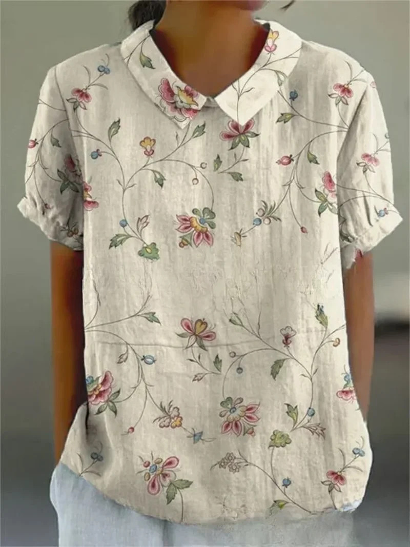 Damen Polo mit floralem Stickmuster und kurzen Ärmeln