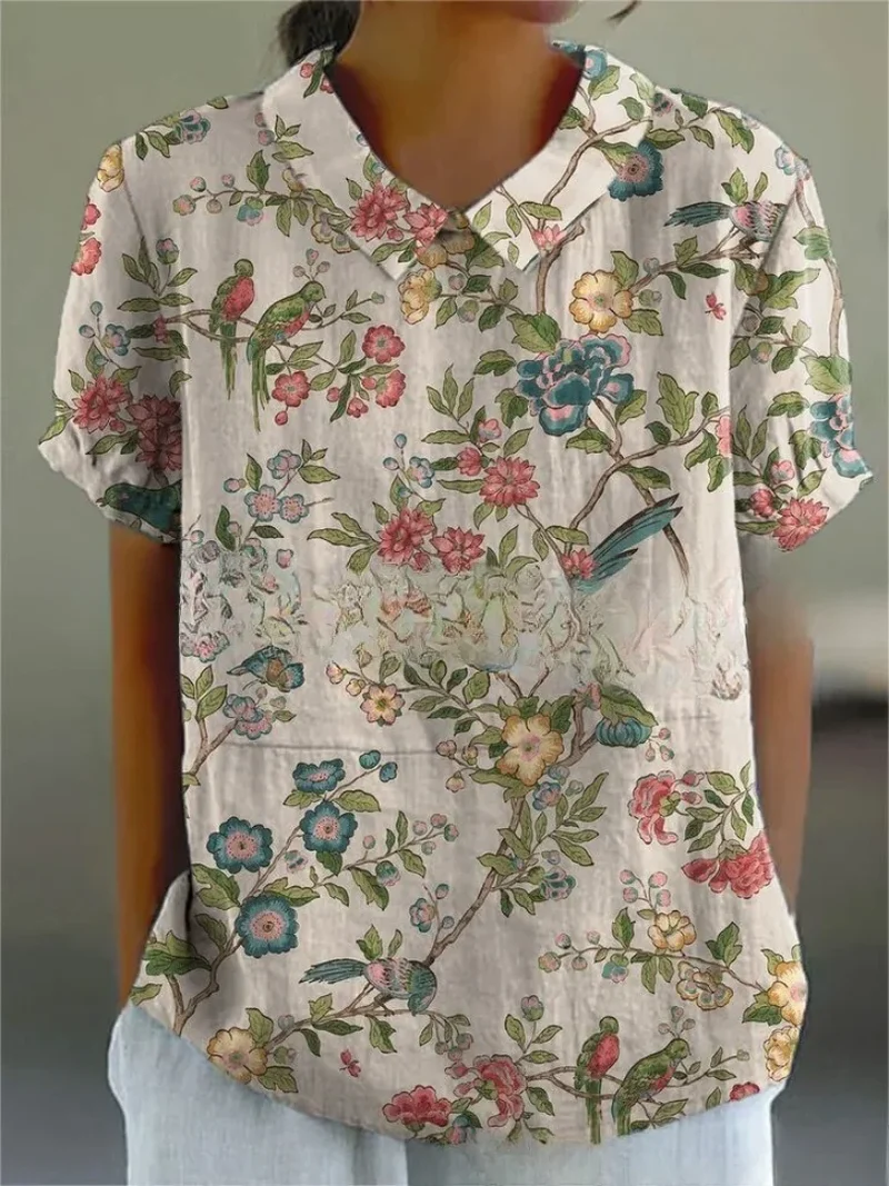 Damen Polo mit floralem Stickmuster und kurzen Ärmeln