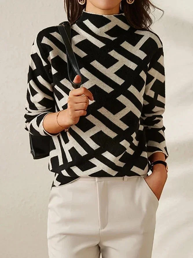 Damenpullover mit geometrischem Muster in Schwarz-Weiß