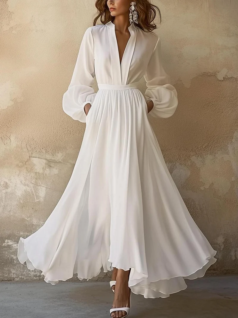 Fließendes weißes Maxikleid