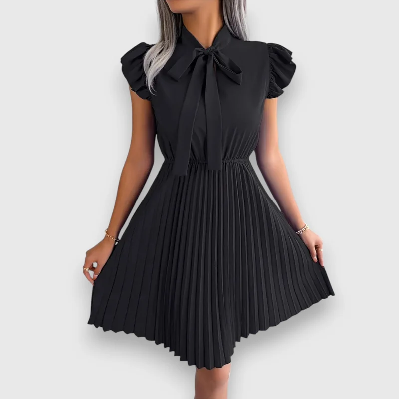 Nivara – Plissiertes Kleid mit femininer Note