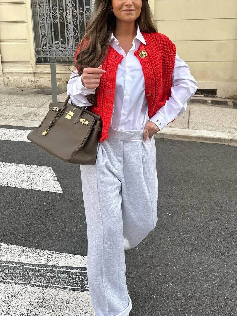 Eleganter ärmelloser, cropped Strickcardigan mit Taschen