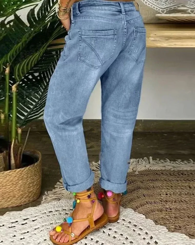 Damen Jeans mit Knopfleiste und Rissen in Blau