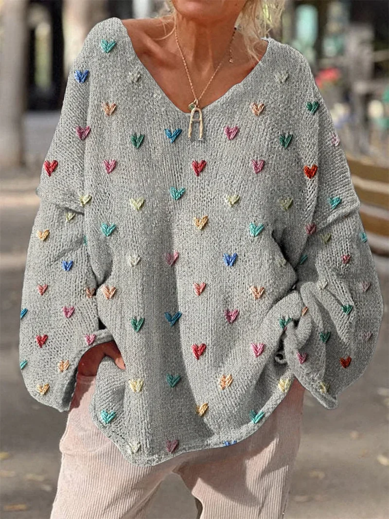 Damen Strickpullover mit bunten Herzmotiven und V-Ausschnitt