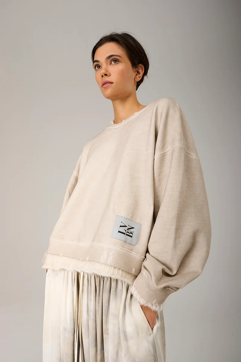 Sweater asymetric in nature