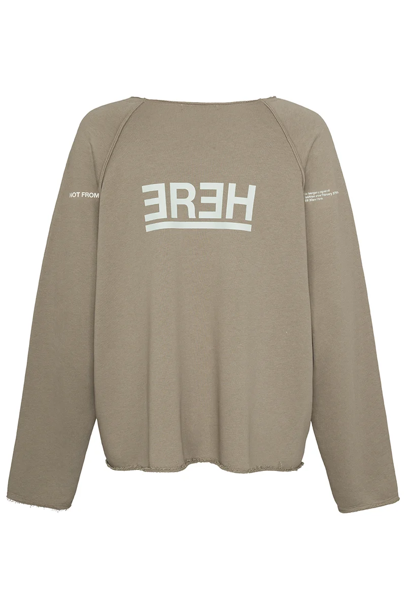 Sweater not from here in mud