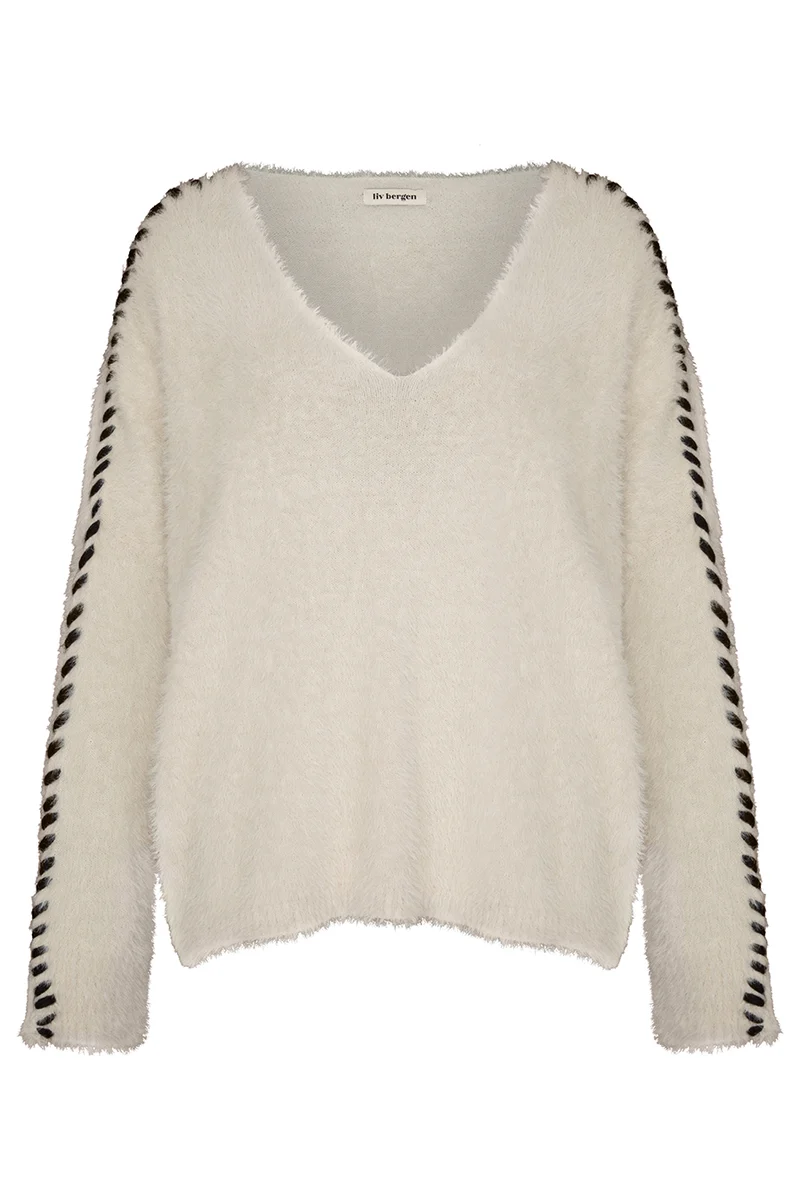 Sweater handstitched in creme