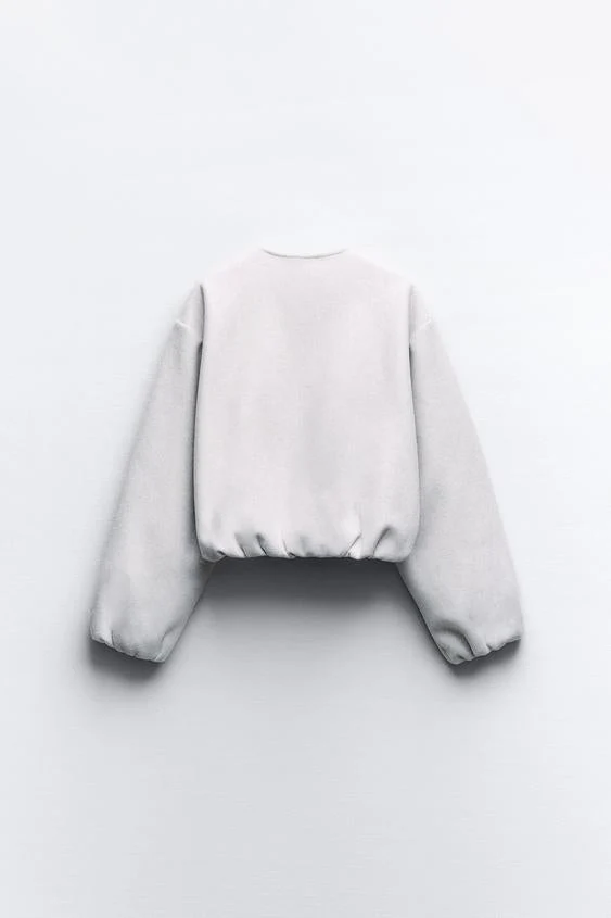 Kurze Jacke für Damen mit Puffärmeln und kragenlosem Rundhalsausschnitt