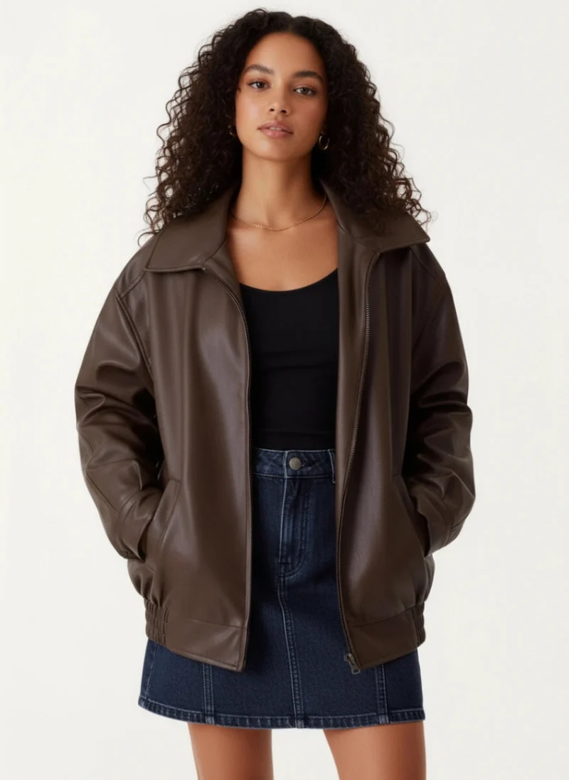 Moderne Oversized Jacke für Damen mit breitem Blazerkragen und elastischem Saum