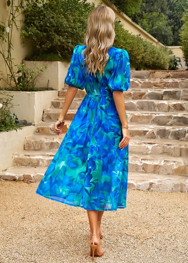 Estella™ - Schmeichelhaftes Blumen-Midi-Kleid