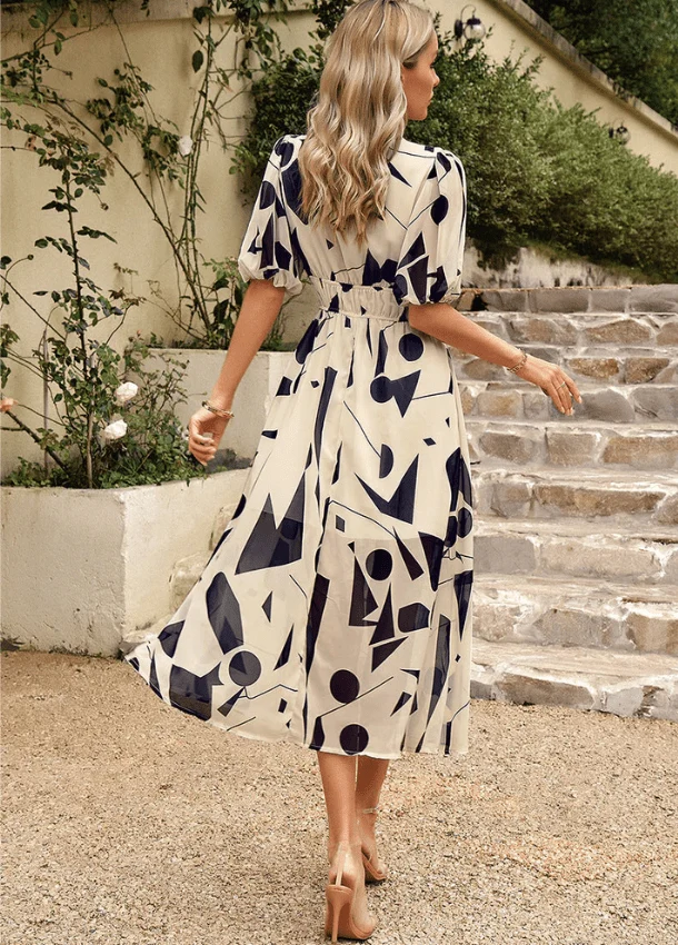 Estella™ - Schmeichelhaftes Blumen-Midi-Kleid