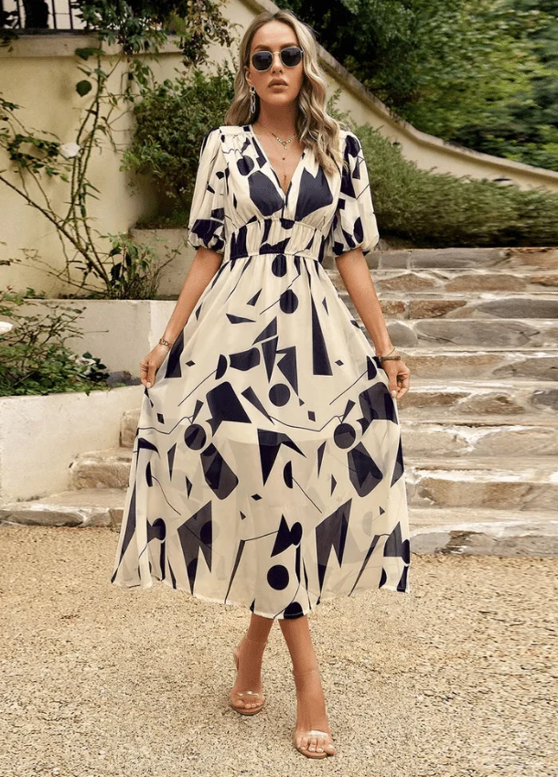 Estella™ - Schmeichelhaftes Blumen-Midi-Kleid