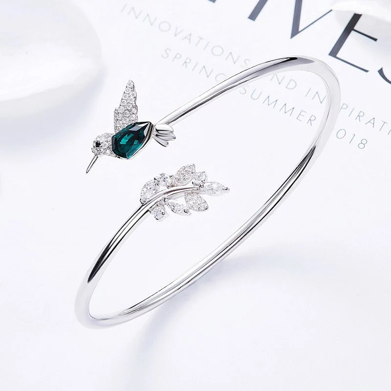 AYANA – Eleganter verstellbarer Kolibri-Ring mit funkelndem Strassdiamant