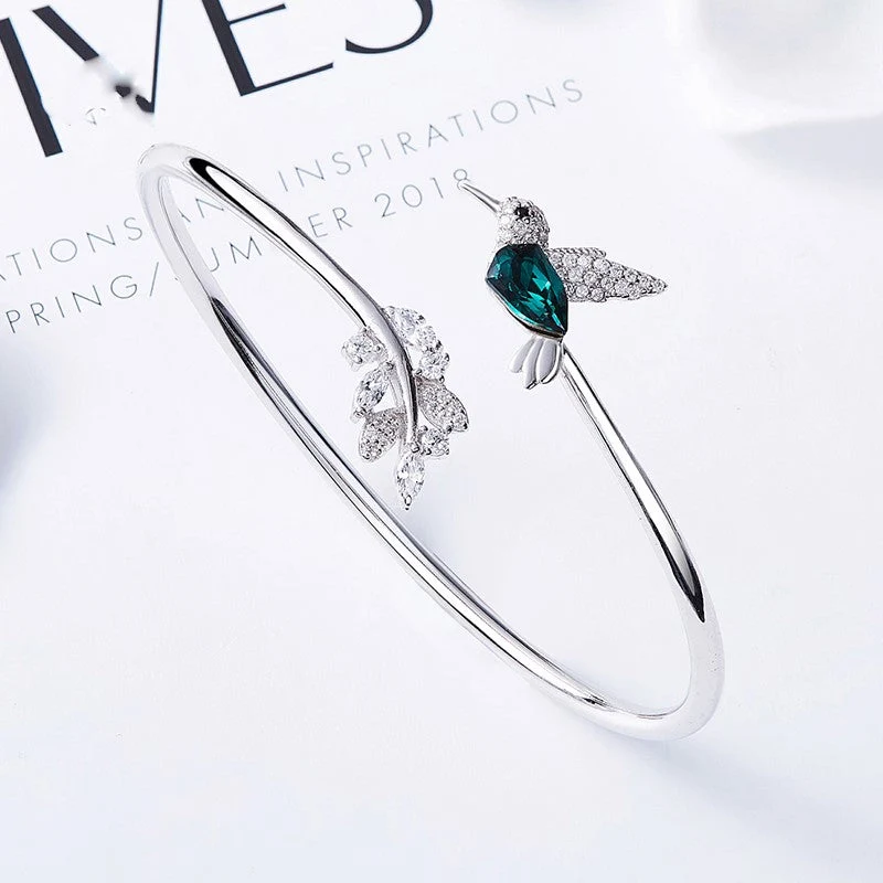 AYANA – Eleganter verstellbarer Kolibri-Ring mit funkelndem Strassdiamant